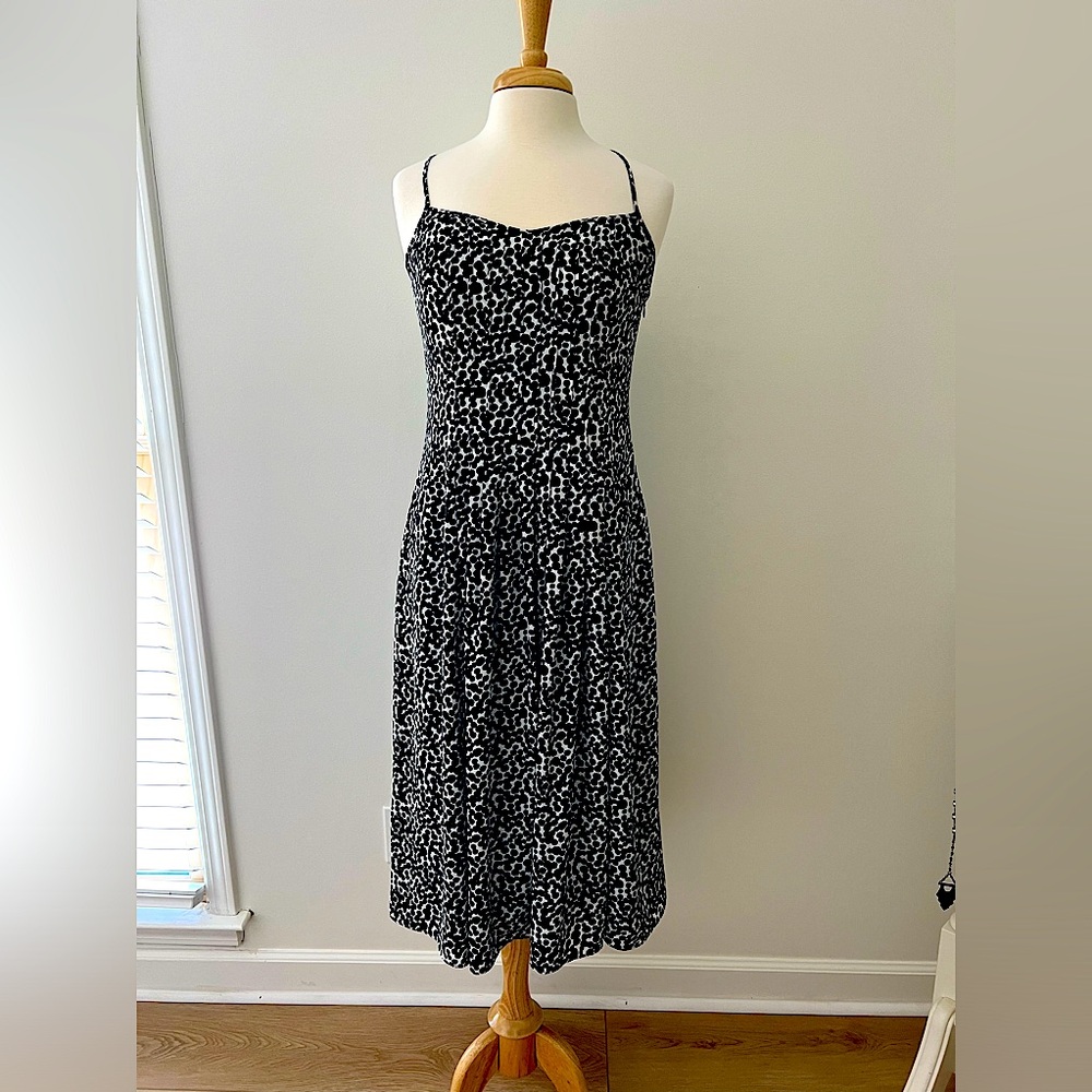 Banana Republic Size 10 Midi dress. Super cute detailing. Side Zip.